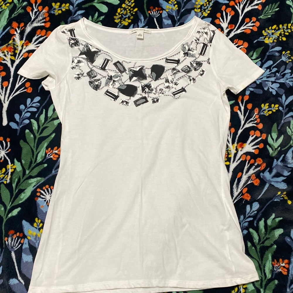 Crisp white tee with black and silver gemstone front